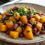 Served kidney beans and squash side dish recipe with parsley garnish